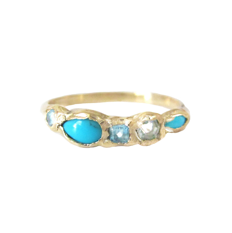 Turquoise and blue topaz gold ring. 
