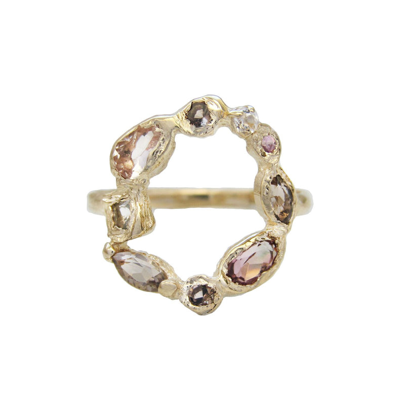 Ama harbor phoenix ring made with morganite, smoky quartz, white topaz, pink sapphire and pink tourmaline.