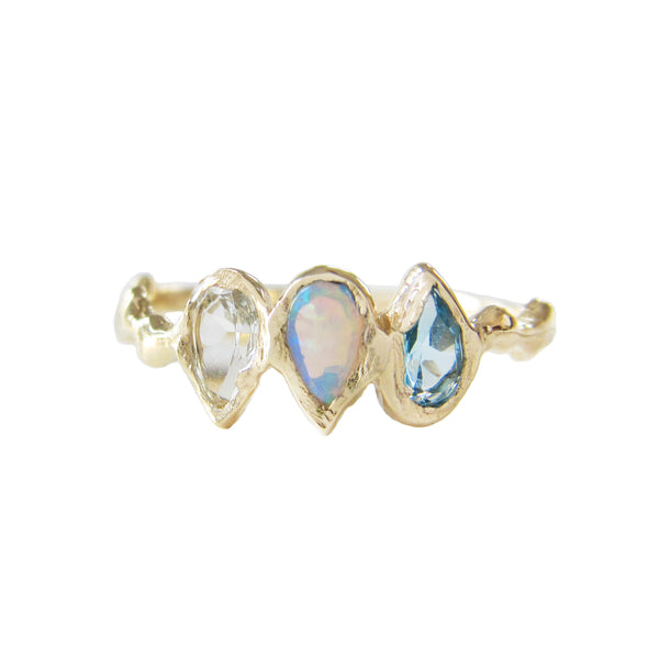 Rising mermaid ring made with aquamarine, opal and blue topaz. 