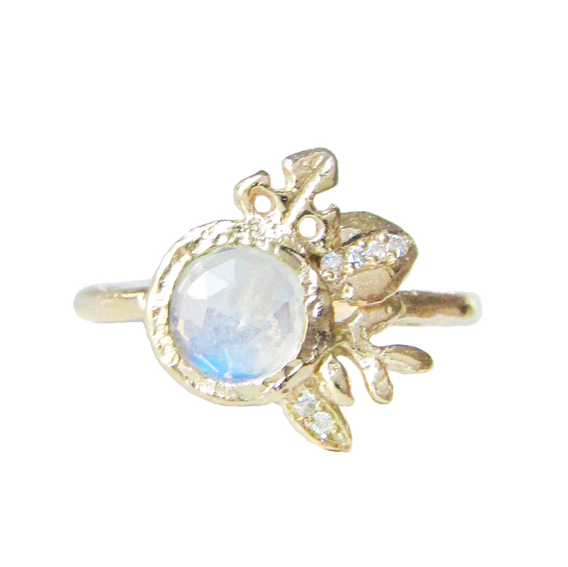 Bouquet moonstone ring with white round brilliant diamonds.