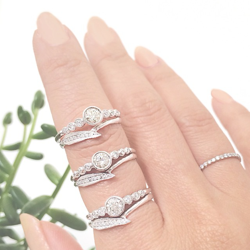 3 Sets of 14K White gold rings with White round brilliant diamonds.