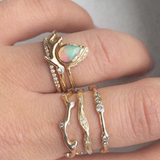 14K Raindrop Opal Ring on Woman's Hand.