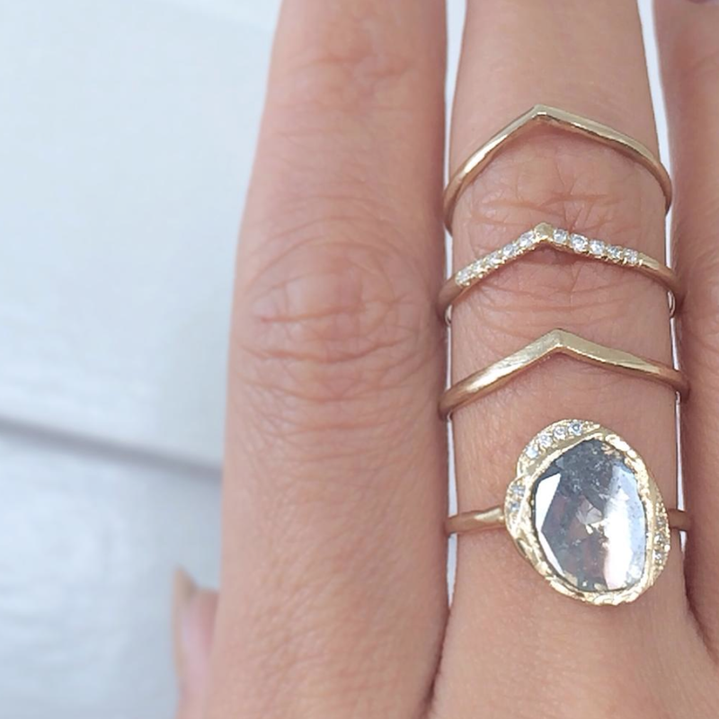 1 Yellow Gold Mini Beak Ring with diamonds and 2 without diamonds on woman's hand.