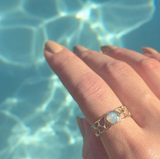 Gold Opal Ring by the water.