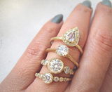 4 14K Yellow Gold Rings, including the Water Drop Ring.